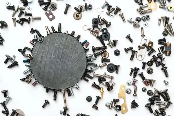 Magnet sticking to ferromagnetic metals